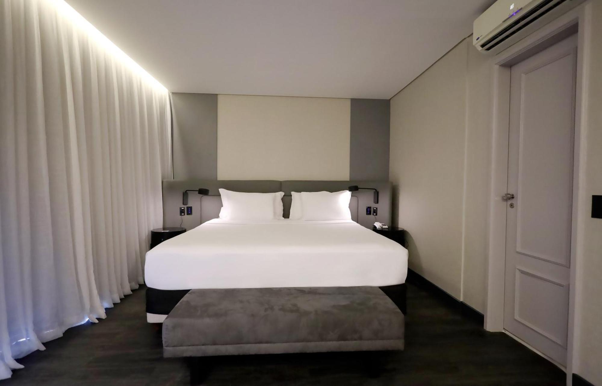 奥斯卡弗莱雷丽笙酒店 圣保罗 外观 照片 A bedroom at the hotel