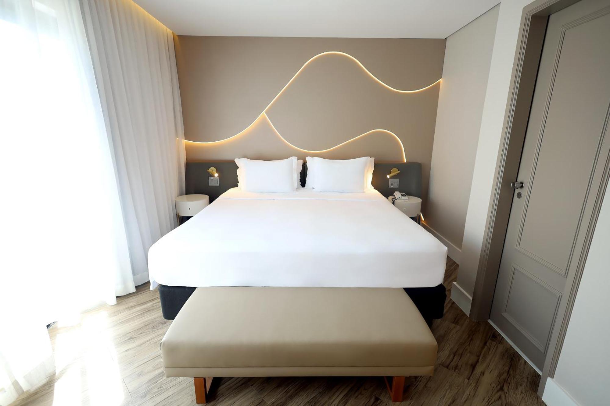 奥斯卡弗莱雷丽笙酒店 圣保罗 外观 照片 A bedroom at the hotel
